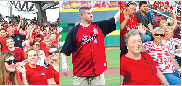 St. Ann parish brought a big crowd to a recent Cincinnati Reds' game and their pastor delivered the game ball. (CT Photos/John Stegeman)