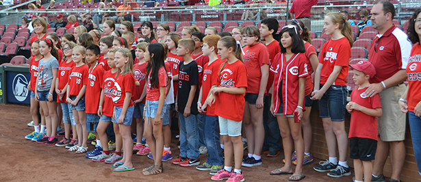 The St. Maximilian Kolbe Children's Choir sang the national anthem at the Cincinnati Reds' game Aug. 22. (CT Photo/John Stegeman)