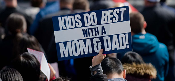 Woman displays sign during March for Marriage rally in Washington