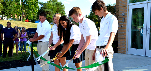 Members of Catholic Central High School’s student leadership cut the ribbon on Aug. 14., 2014. (CT Photo/John Stegeman)