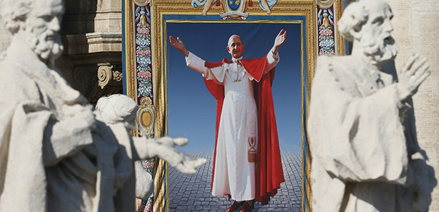 A tapestry of Blessed Paul VI hangs from the facade of St. Peter's Basilica during his beatification Mass celebrated by Pope Francis in St. Peter's Square at the Vatican Oct. 19. The Mass also concluded the extraordinary Synod of Bishops on the family. Blessed Paul, who served as pope from 1963-1978, is most remembered for his 1968 encyclical, "Humanae Vitae," which affirmed the church's teaching against artificial contraception. (CNS photo/Paul Haring) See BEATIFICATION-MASS Oct. 19, 2014.