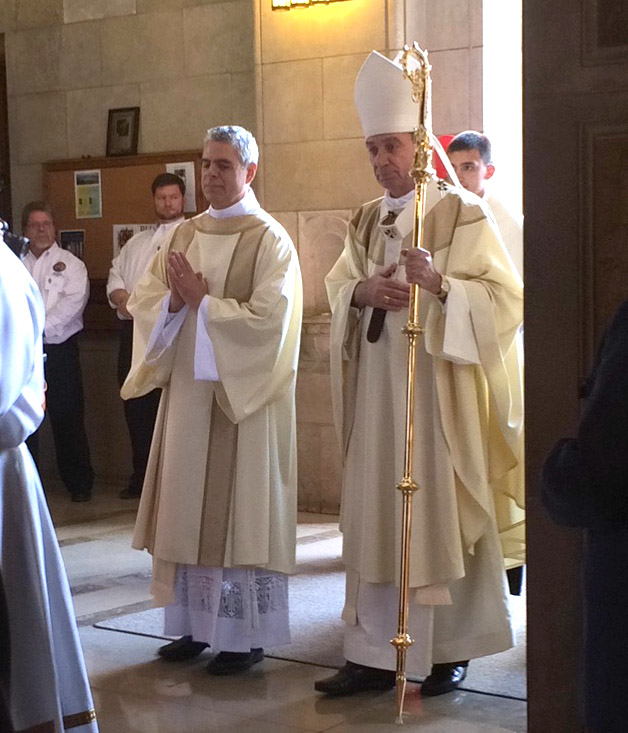 Archbishop Dennis M. Schnurr, right, processes in during the installation Mass for Bishop Daniel Thomas as Bishop of Toledo. Archbishop Schnurr was one of the installing bishops. (Courtesy Photo)