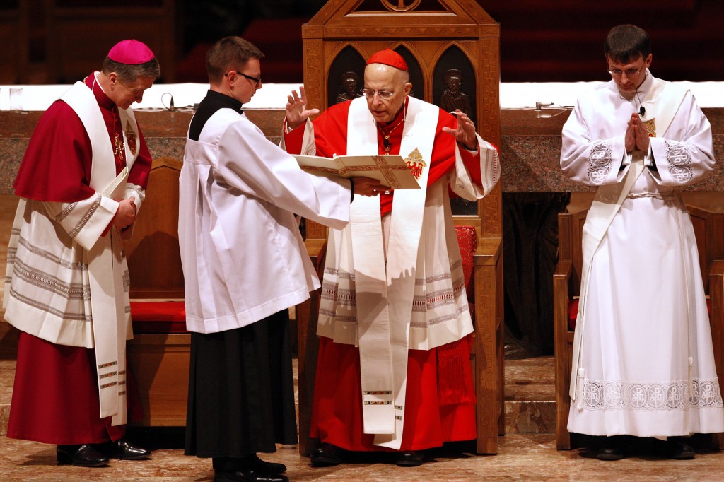Cardinal Francis E. George gives the final blessing during a rite of welcome ceremony for Archbishop Blase J. Cupich Nov. 17 at Holy Name Cathedral in Chicago. Archbishop Cupich, whose installation as Chicago's new archbishop was set for Nov. 18, is Pope Francis' first major appointment for the hierarchy of the U.S. Catholic Church. (CNS photo/John Smerciak, Catholic New World) See CUPICH-INSTALL Nov. 18, 2014.