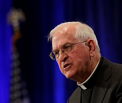 Archbishop Joseph E. Kurtz of Louisville, Ky., president of the U.S. Conference of Catholic Bishops, gives his address Nov. 10, 2014 the first day of the annual fall general assembly of the U.S. Conference of Catholic Bishops in Baltimore. (CNS photo/Bob Roller) 