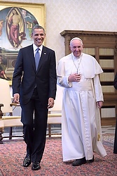 U.S. President Barack Obama walks with Pope Francis during a private audience at the Vatican March 27. (CNS photo/Stefano Spaziani, pool) (March 27, 2014) 