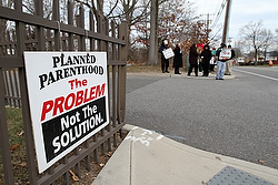 Pro-life advocates participate in a prayer vigil in January near the entrance to a Planned Parenthood clinic in Smithtown, N.Y., that performs abortions. (CNS photo/Gregory A. Shemitz) 