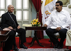 Archbishop Diego Padron Sanchez, president of the Venezuelan bishops' conference, talks with Venezuela's President Nicolas Maduro during a meeting in early June at Miraflores Palace in Caracas. (CNS photo/Carlos Garcia Rawlins , Reuters)