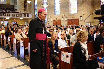 Bishop David M. O'Connell of Trenton, N.J., greets students gathered at St. Mary of the Assumption Cathedral in Trenton, for the diocese's annual Catholic schools Mass Oct. 7, 2014. (CNS photo/Craig Pittelli, courtesy The Monitor) 