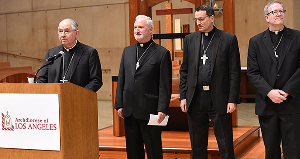 Los Angeles Archbishop Jose H. Gomez introduces Msgr. David G. O'Connell, Msgr. Joseph V. Brennan and Father Robert Barron July 21 at the Cathedral of Our Lady of the Angels in Los Angeles. The three priests will serve as auxiliary bishops of the largest archdiocese in the United States in terms of Catholic population. (CNS photo/Tamara Tirado) 