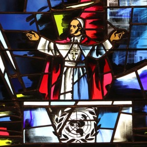 Pope Paul VI's address to the U.N. General Assembly in New York City in 1965 is depicted in a stained-glass window at the Immaculate Conception Center in Douglaston, N.Y. Oct. 4 will mark the 50th anniversary of the historic speech. Pope Francis will address the General Assembly Sept. 25. (CNS photo/Gregory A. Shemitz) 