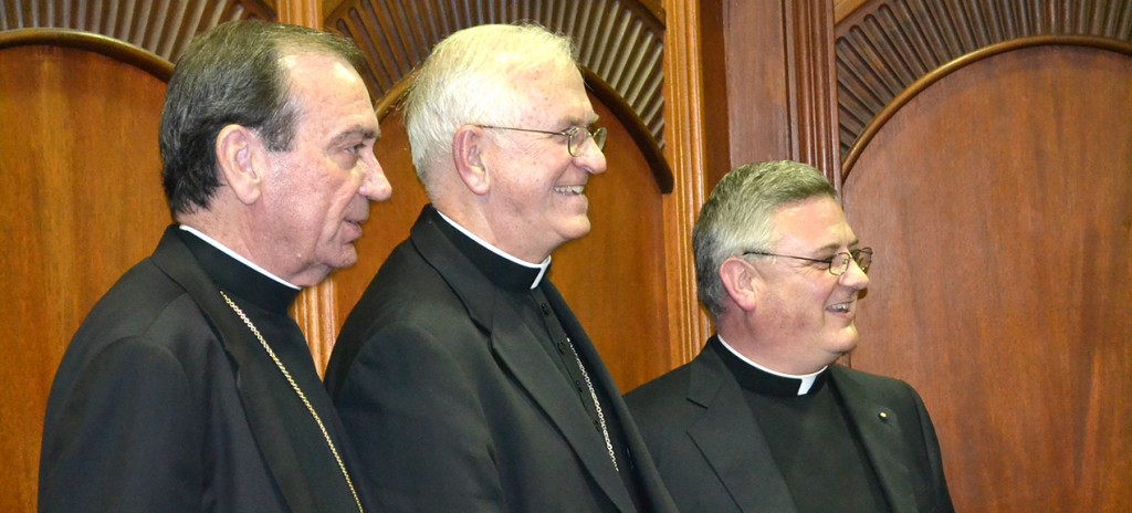 Archbishop Joseph Kurtz of Louisville, left, is flanked by Archbishop Dennis M. Schnurr of Cincinnati, left, and Father Benedict O’Cinnsealaigh, rector and president of Mount St. Mary’s of the West Seminary after he delivered the annual James C. Gardner Lecture on Moral Theology Dec. 9 in the Bartlett Pastoral Center. Archbishop Kurtz, president of the USCCB, was a delegate to the Vatican Synod on the Family called by Pope Francis this past summer. (CT Photo/Steve Trosley)