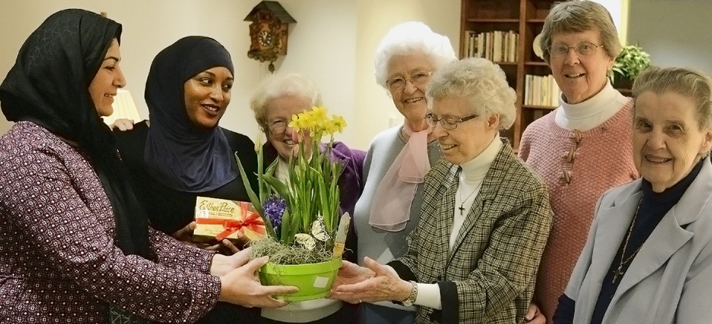 The Weavers cluster of Precious Blood Sisters welcomed two members from the Fazle Umar Mosque in Dayton to Salem Heights for a tour and interfaith conversation. From left, Bushra Shahid, Ashely Yaqoob of the Fazle Umar Mosque in Dayton and Sisters Katie (M. Joseph Marie) Lett, Ellie (M. Thomas) McNally, Rosemary (M. Jean Therese) Goubeaux, Madonna Ratermann and Berenice (M. Edward) Janszen. (Courtesy Photo/Sisters of the Precious Blood)