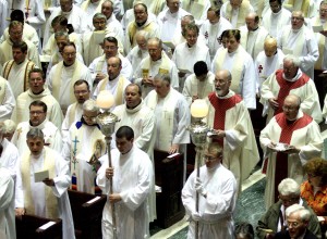 Auxiliary Bishop Joseph R. Binzer and priests process in at the start of the 2010 Chrism Mass. (CT Photo/E.L. Hubbard)
