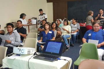 Hispanic adults students are shown attending a Catholic Social Teaching formation program recently. (Courtesy Photo)