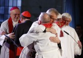 The Rev. Martin Junge, general secretary of the Lutheran World Federation, embraces Bishop Munib Younan of the Evangelical Lutheran Church, president of the Lutheran World Federation, front center, during an ecumenical prayer service at the Lutheran cathedral in Lund, Sweden, Oct. 31. At right, Pope Francis embraces Archbishop Antje Jackelen, primate of the Lutheran Church in Sweden. At left is Bishop Anders Arborelius of Stockholm and Cardinal Kurt Koch, president of the Pontifical Council for Promoting Christian Unity. (CNS photo/Paul Haring)