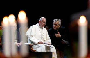 Pope Francis talks with the Rev. Martin Junge, general secretary of the Lutheran World Federation, during an ecumenical event at the Malmo Arena in Malmo, Sweden, Oct. 31. Also pictured is Bishop Munib Younan of the Evangelical Lutheran Church, president of the Lutheran World Federation, left. The event opened a year marking the 2017 commemoration of the 500th anniversary of the Protestant Reformation. (CNS photo/Paul Haring)