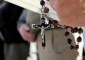 A man holds a Rosary during the 10th Annual Cincinnati Rosary Crusade on Fountain Square Saturday, October 8, 2016. (CT Photo/E.L. Hubbard)
