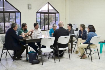 Members of the parish of St. Dominic Salvio explain their parish-wide catechetist training program. (CT/Photo by Gail Finke)