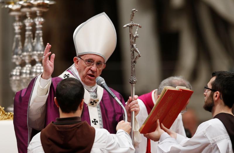 Pope Francis delivers his blessing at the conclusion of Ash Wednesday Mass in St. Peter's Basilica at the Vatican (CNS photo/Paul Haring)
