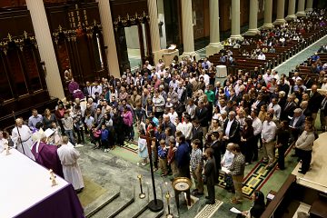 Auxiliary Bishop Joseph Binzer addresses the Catechumens and their godparents during the Rite of Election of Catechumens and of the Call to Continuing Conversion of Candidates who are preparing for Confirmation and Eucharist or Reception into Full Communion with the Roman Catholic Church at the Cathedral of St. Peter in Chains in Cincinnati Sunday, Mar. 5, 2017. (CT PHOTO/E.L. HUBBARD)