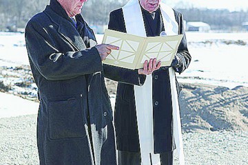 Tony Maas, president and CEO of JTM Food Group, asked Archbishop Dennis M. Schnurr to bless the groundbreaking for the Harrison Company's $26.1 million expansion. (Courtesy Photo)