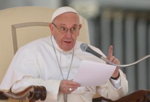 Pope Francis speaks during his general audience in St. Peter's Square at the Vatican March 15. (CNS photo/Paul Haring)