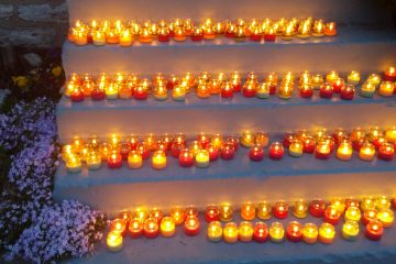 In the darkest hour when our Saviour was crucified, pilgrims pierce the darkness with votive candles. (Greg Hartman CT/Photo)