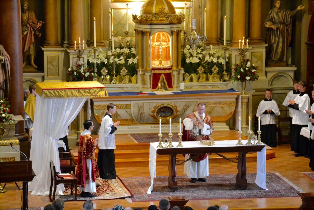 Archbishop Schnurr censing the altar at the beginning of Mass. (CT Photo/Gail Finke)
