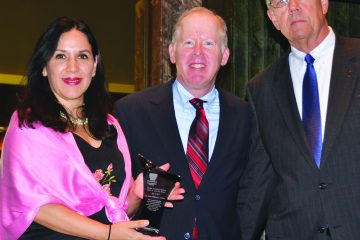 Pictured are Giovanna Alvarez of Su Casa; Elliot Grossman, President of the Cincinnatius Association and Ted Bergh, executive director of Catholic Charities of Southwestern Ohio, at the presentation of the Donald and Marian Spencer Spirit of America Awards May 9. (Courtesy Photo)