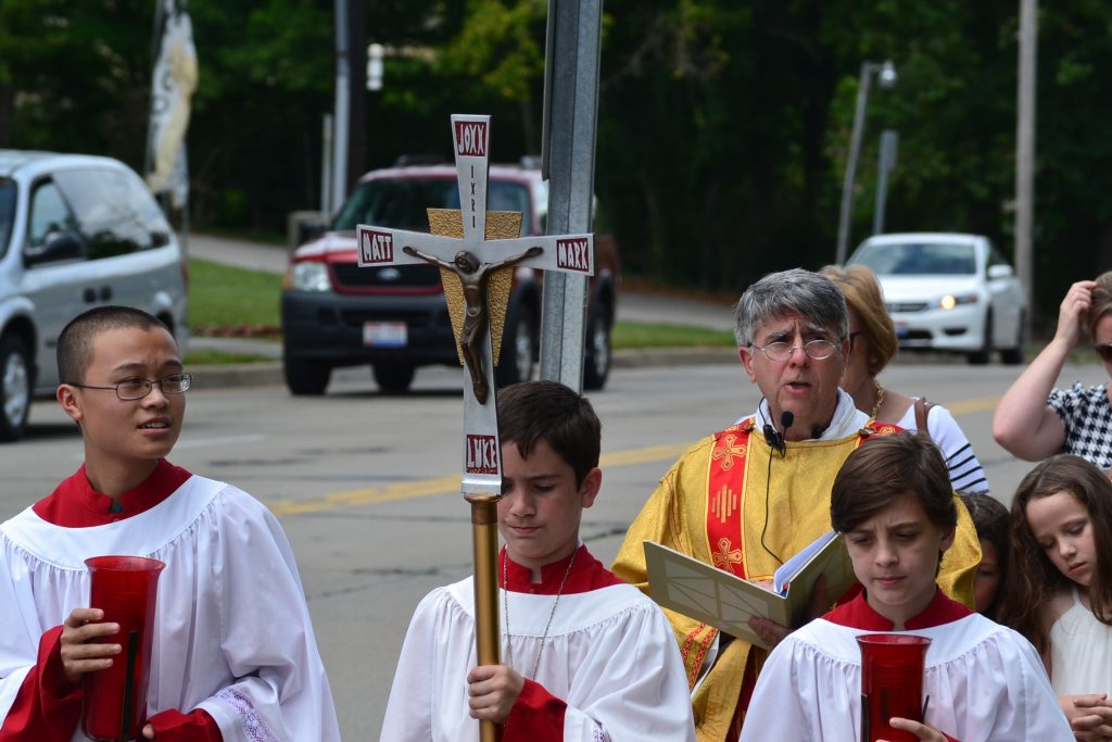 Led by the Cross at the Corpus Christi Procession. (CT Photo/Greg Hartman)