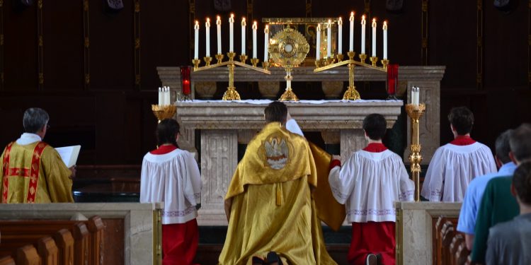 The Corpus Christi procession concluded with Benediction at the Chapel of St. Gregory the Great (CT Photo/Greg Hartman)