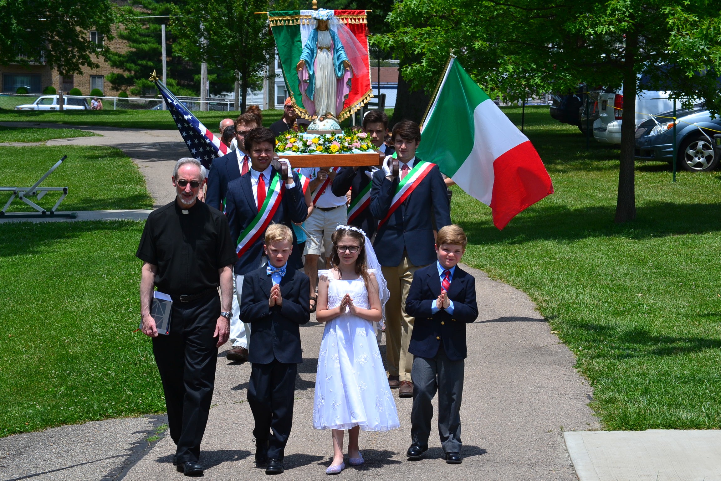 Marian Procession begins led by Fr. Anthony Dattilo and St. Catharine of Siena Westwood Grade School First Communicants. (CT Photo/Greg Hartman)