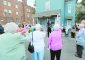 Rev. Michael Pucke. pastor of St. Julie Billiart Catholic Parish in Hamilton, leads a cheer to Sr. Dorothy during the blessing of “The Sr. Dorothy Stang House”, a house for homeless families, during a dedication ceremony in Hamilton Saturday, May 27, 2017. (CT Photo/E.L. Hubbard)