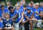 St. Xavier Bombers take a knee in prayer (CT Photo/Gail Finke)