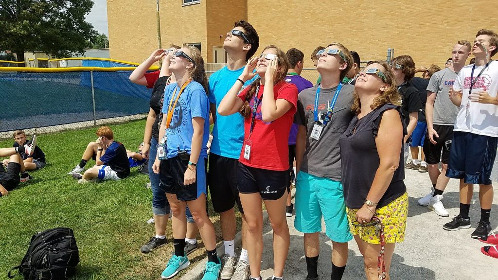 Carroll High School Students in Dayton looking at partial eclipse 2017 (Courtesy Photo)