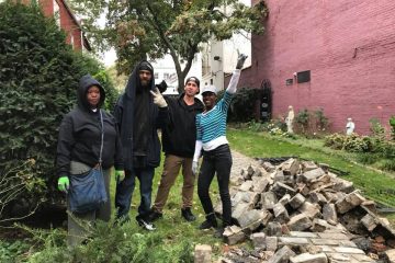 Several of the people who stopped to help posed for this group photo. About 10 people, all of them homeless, helped with the cleanup over the course of the morning, said Sister Marie-Cecile. COURTESY PHOTO