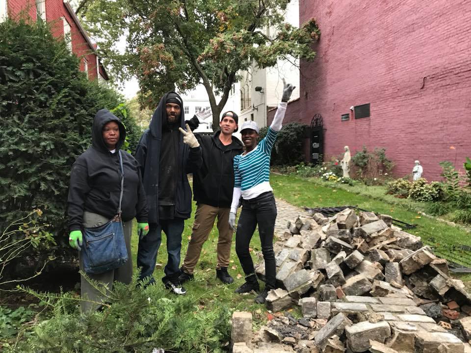 Several of the people who stopped to help posed for this group photo. About 10 people, all of them homeless, helped with the cleanup over the course of the morning, said Sister Marie-Cecile. COURTESY PHOTO