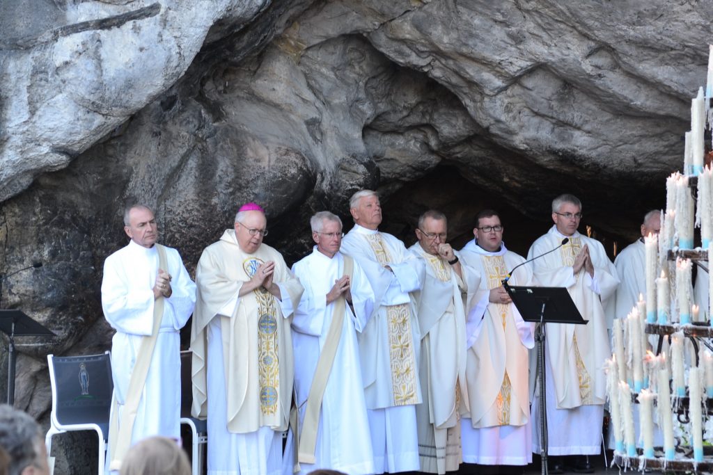 Celebrants in the cave where St. Bernadette saw her vision of the Blessed Mother, September 29. 2017 (CT Photo/Greg Hartman)