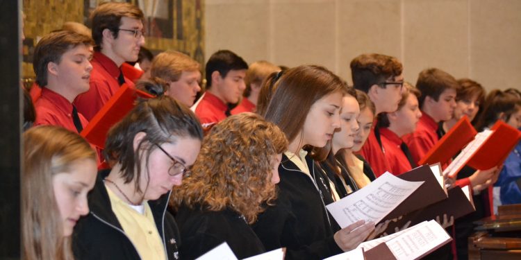 Vocal Ensemble of McAuley High School, LaSalle High School, and Mother of Mercy High School sing at the 2018 Catholic Schools Week Mass (CT Photo/Greg Hartman)