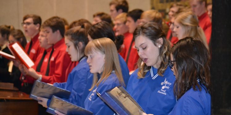 Mother of Mercy Vocal Ensemble with La Salle Vocal Ensemble and McAuley Vocal Ensemble singing at the 2018 Catholic Schools Week Mass (CT Photo/Greg Hartman)