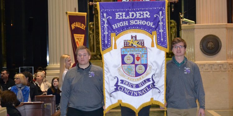 Men of Elder carry their banner in the Procession of Banners. (CT Photo/Greg Hartman)