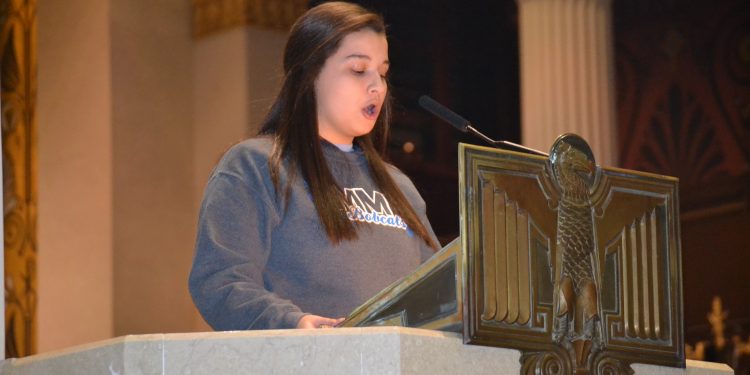 The First Reading was read by Alexis Kemble of Mercy High School (CT Photo/Greg Hartman)