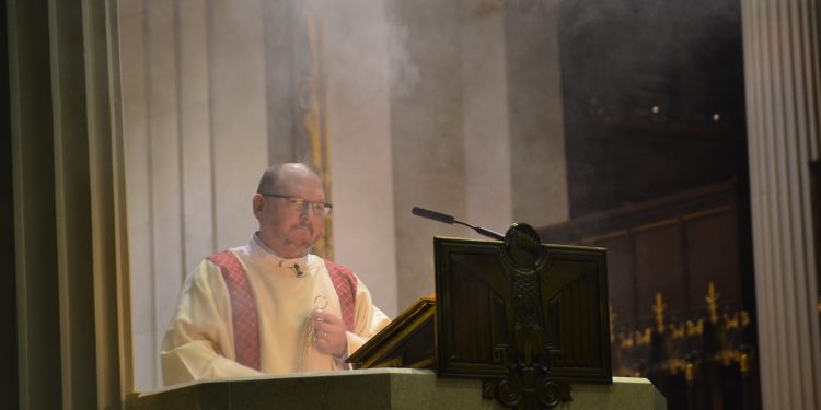 Preparing for the Gospel Reading at the 2018 Catholic Schools Week Mass (CT Photo/Greg Hartman)