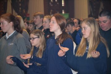 Praying at Mass a strong part of a Catholic Schools Education. (CT Photo/Greg Hartman)