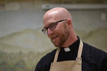 Father Kyle Schnippel during the "cook off" at St. John Neumann Parish (CT Photo/Greg Hartman)