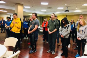 Lehman High School prepares in prayer before departure for Washington DC (Courtesy Photo)