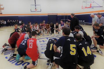 Prayer Break during hoops game between Cardinal Pacelli & mount Saint Mary's Seminary (Courtesy Photo)