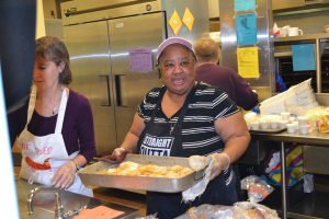 Another hardworking night at St. Francis DeSales Fish Fry. Mrs. Rosetta McDowell-cook, school receptionist, mother and grandmother to many SFDS alumni (including Daniel Powell and Isaiah Smiley!)., Mrs. Tamiko Smiley-PTO president, PK teacher, alum and daughter of Mrs. McDowell!, (CT Photo/Greg Hartman)