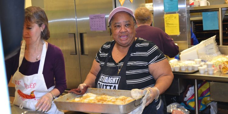 Another hardworking night at St. Francis DeSales Fish Fry. Mrs. Rosetta McDowell-cook, school receptionist, mother and grandmother to many SFDS alumni (including Daniel Powell and Isaiah Smiley!)., Mrs. Tamiko Smiley-PTO president, PK teacher, alum and daughter of Mrs. McDowell!, (CT Photo/Greg Hartman)