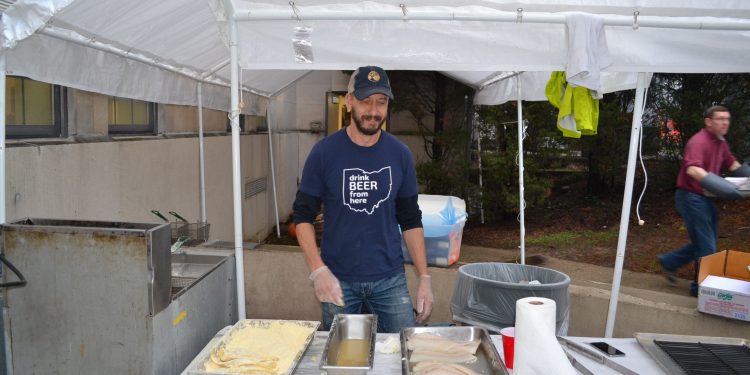 Another of literally hundreds of volunteers working the Fish Fry at Our Lord Christ the King (CT Photo/Greg Hartman)